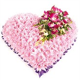 Pink Massed Solid Funeral Heart Arrangement